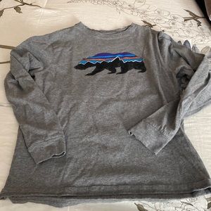 Large long sleeved kids Patagonia shirt.
